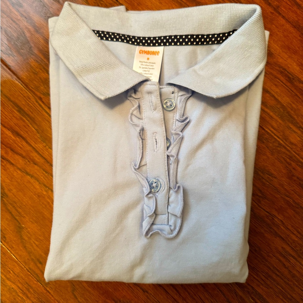 Gymboree girls short sleeved polo shirt with ruffle detail, light blue